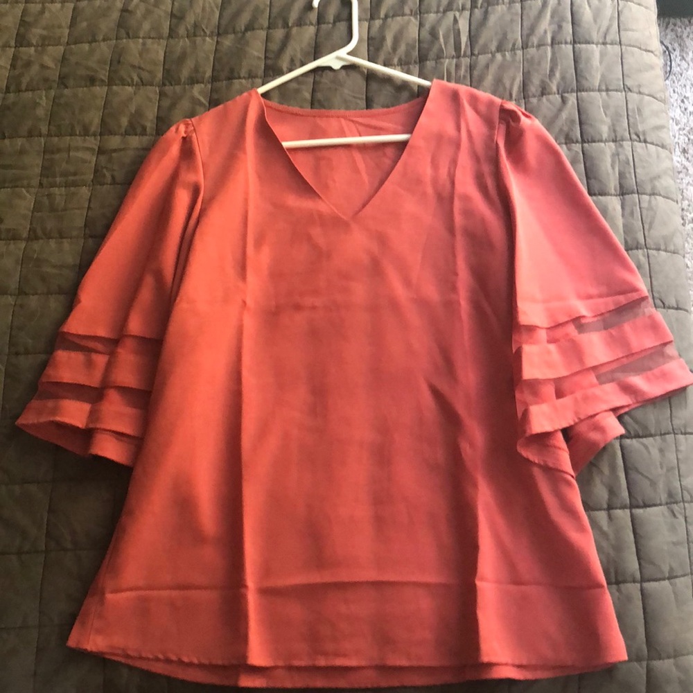 Salmon colored top